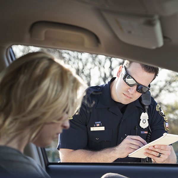 Woman in Car Pulled over by Cop for Traffic Violation in Glen Burnie, MD